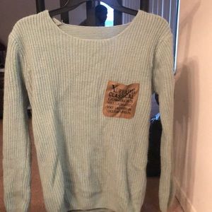 Green mint sweater with leather patch
